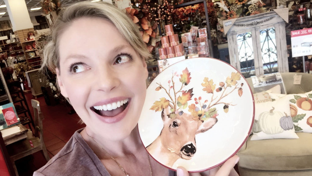 Katherine Heigl holding a fall accent plate
