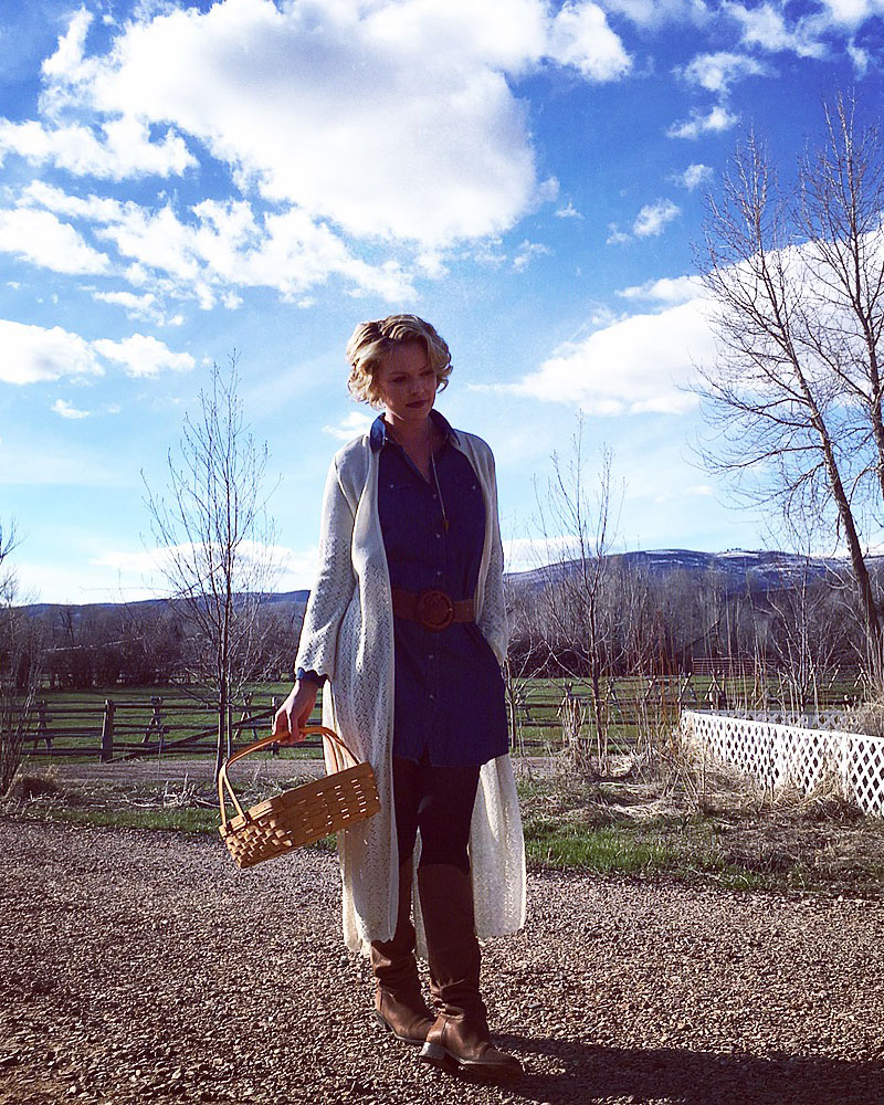 Katherine Heigl collecting eggs on her ranch