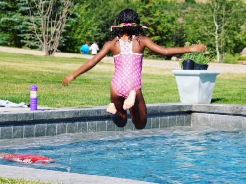 Adalaide jumping into the pool