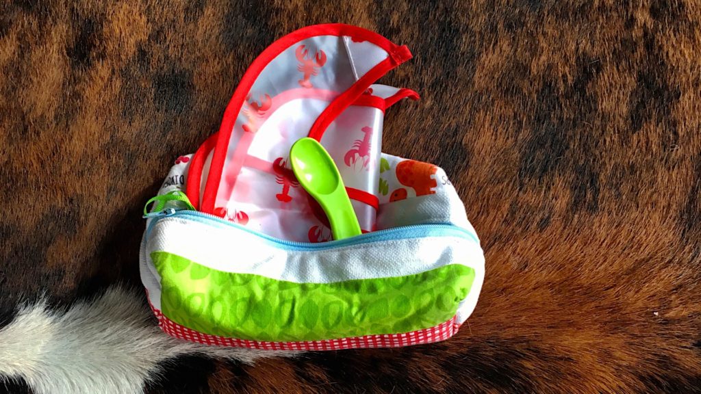One small pouch with a bib, spoon and room for my baby food jars.