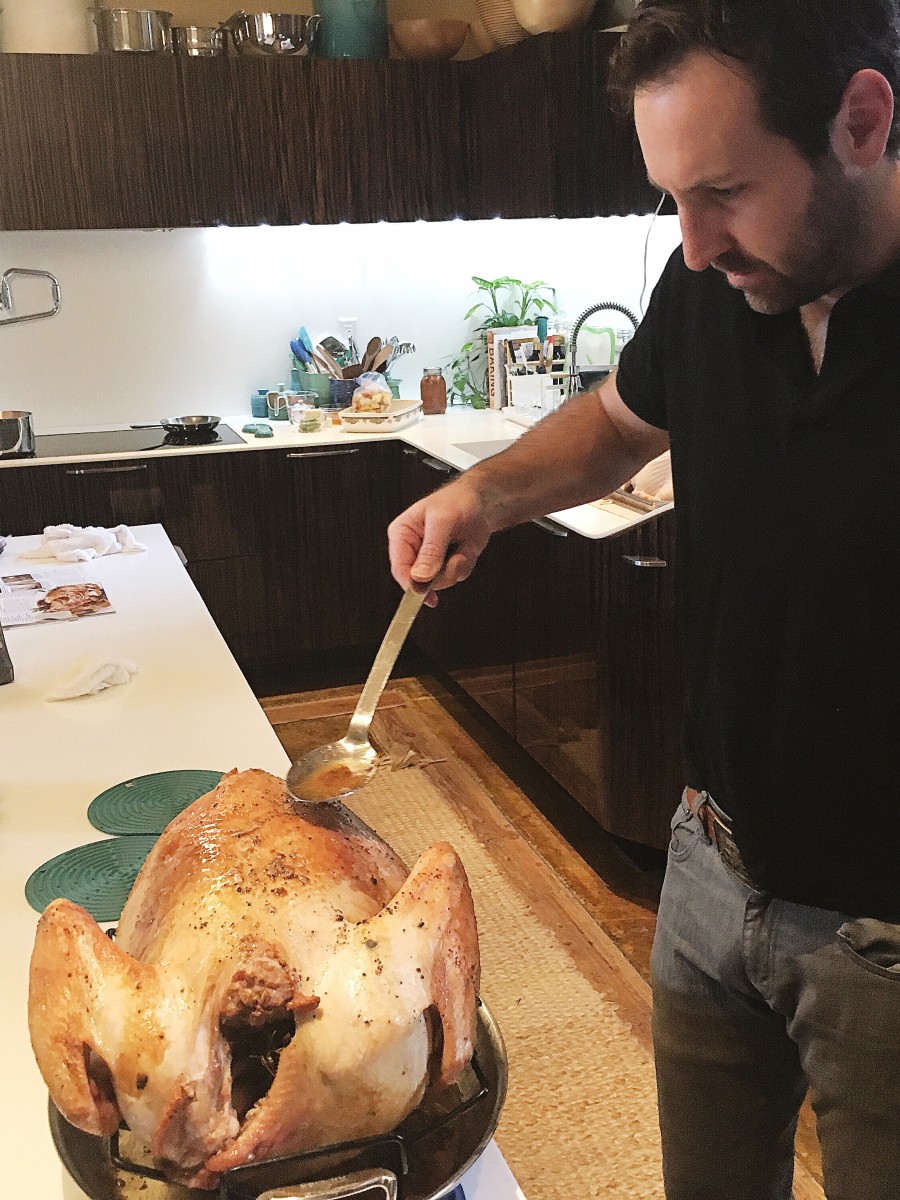 Josh Kelley preparing the Thanksgiving turkey