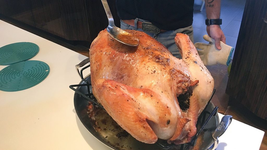 Josh Kelley preparing the Thanksgiving turkey
